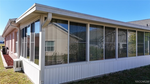 view of home's exterior featuring a sunroom