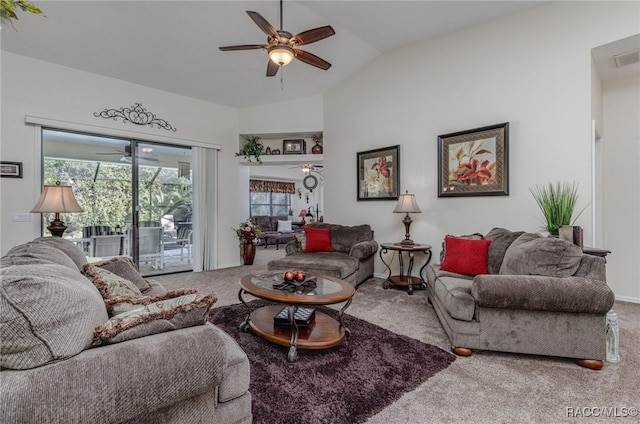 carpeted living room with vaulted ceiling and ceiling fan