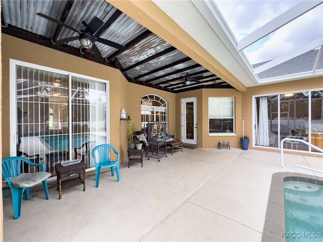 view of patio / terrace featuring ceiling fan