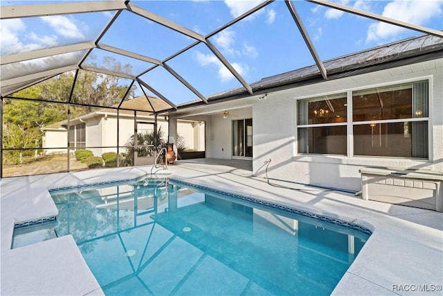 view of pool featuring a patio and a lanai