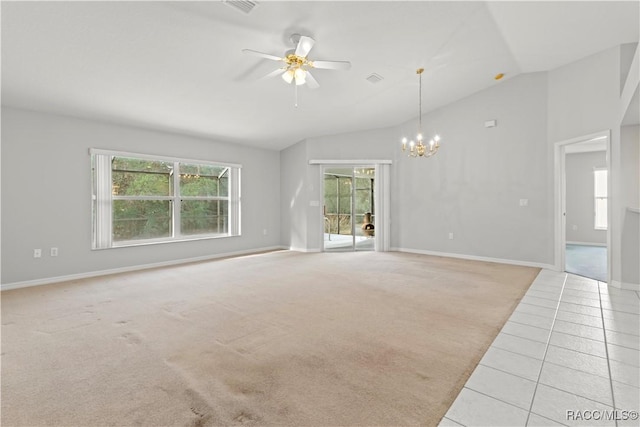 unfurnished living room featuring light carpet, ceiling fan with notable chandelier, and lofted ceiling