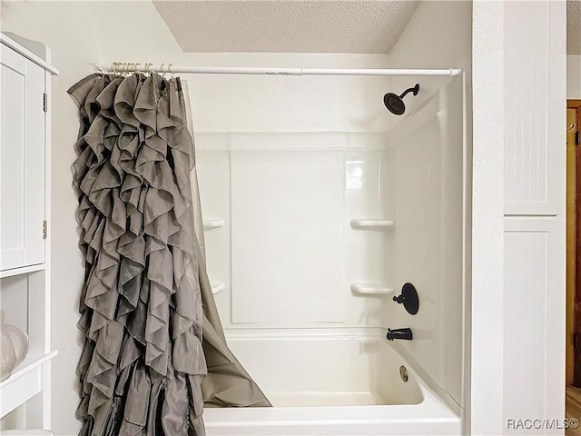 4101 E Gloria Dr, Hernando, FL 34442 - full bathroom featuring shower / bath combo and a textured ceiling