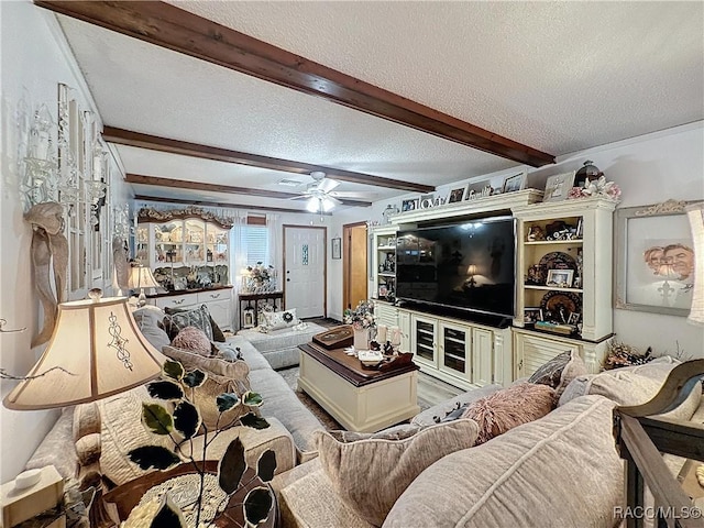 4101 E Gloria Dr, Hernando, FL 34442 - living area with a textured ceiling, ceiling fan, and beam ceiling