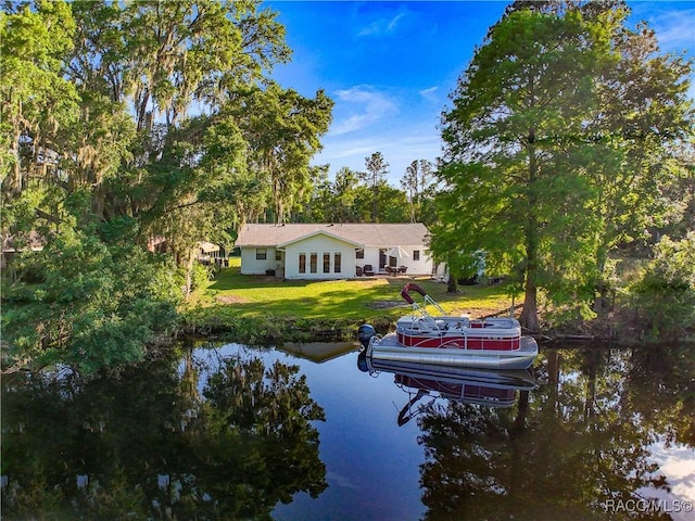 4101 E Gloria Dr, Hernando, FL 34442 - dock area featuring a water view, a yard, and boat lift