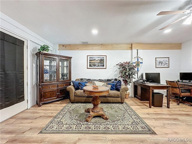 4101 E Gloria Dr, Hernando, FL 34442 - living room with light wood finished floors, ceiling fan, and a desk