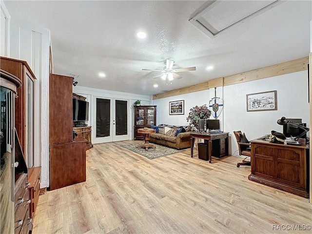 4101 E Gloria Dr, Hernando, FL 34442 - living room with french doors, light wood finished floors, an office area, recessed lighting, and ceiling fan