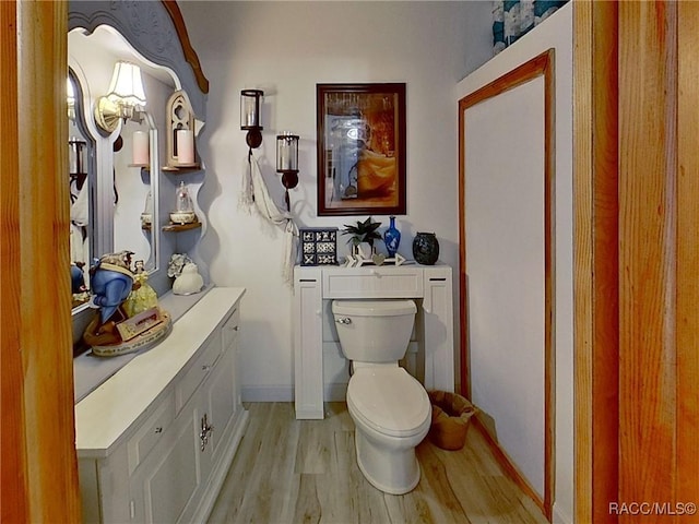 4101 E Gloria Dr, Hernando, FL 34442 - half bathroom with wood finished floors and vanity