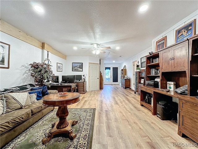 4101 E Gloria Dr, Hernando, FL 34442 - living room featuring a desk, ceiling fan, light wood-style floors, recessed lighting, and a textured ceiling