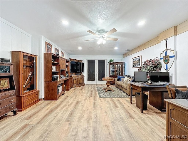 4101 E Gloria Dr, Hernando, FL 34442 - office featuring french doors, light wood-type flooring, a ceiling fan, a textured ceiling, and recessed lighting