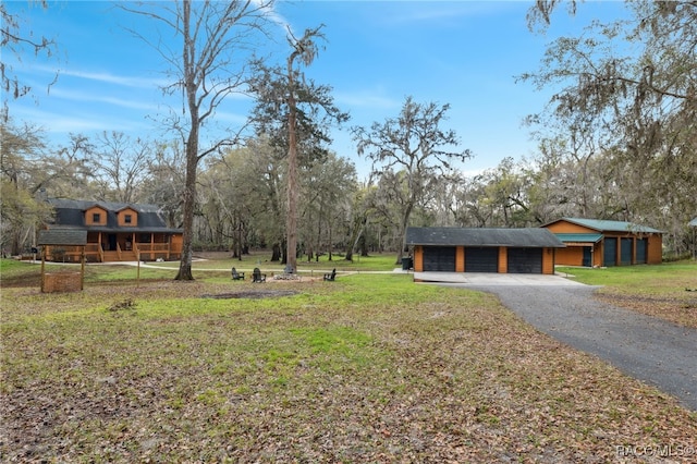 view of yard with a garage