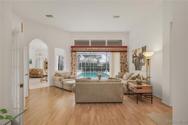 living room with light hardwood / wood-style floors