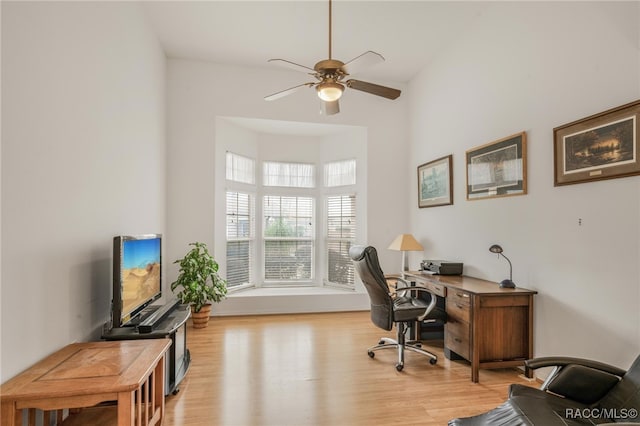 office space with ceiling fan and light hardwood / wood-style floors