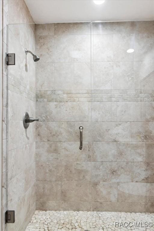 bathroom with an enclosed shower