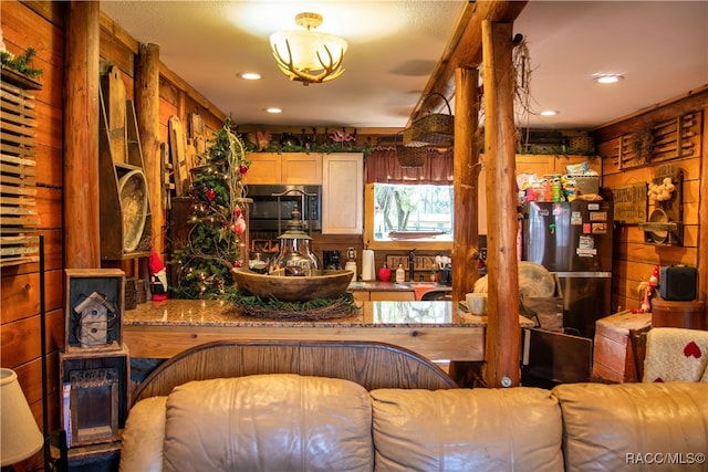 interior space featuring wood walls and sink