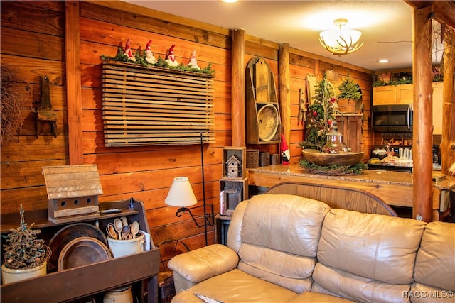 living room with wooden walls