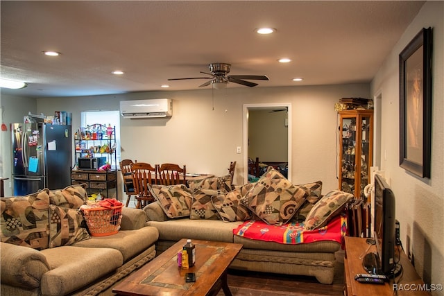 living room featuring a wall mounted AC and ceiling fan