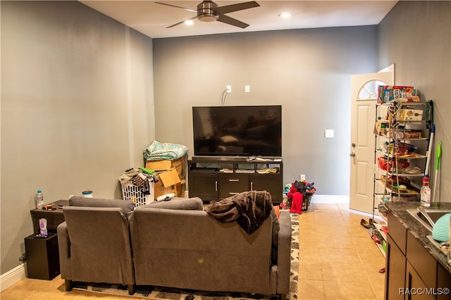 tiled living room featuring ceiling fan