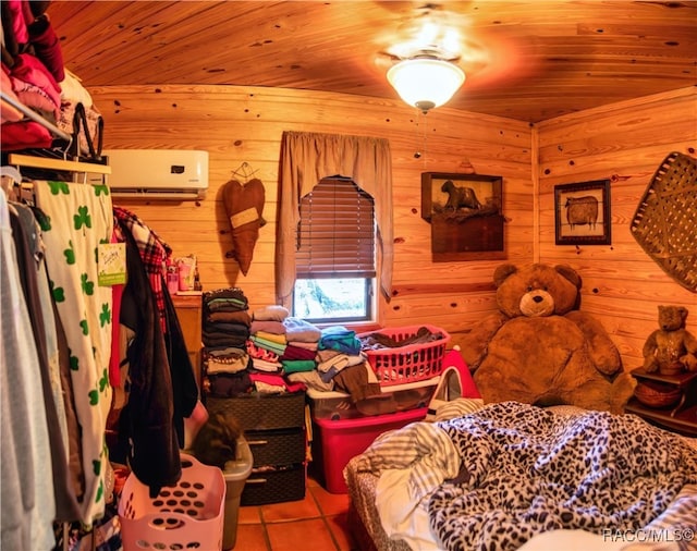 bedroom with tile patterned flooring, wood ceiling, and wooden walls