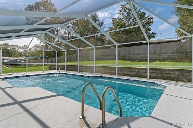 view of swimming pool featuring glass enclosure, a fenced backyard, a fenced in pool, and a patio