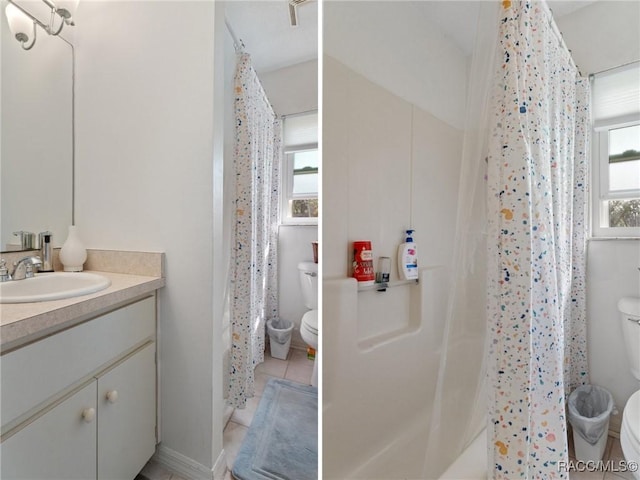 bathroom with toilet, a shower with shower curtain, and vanity