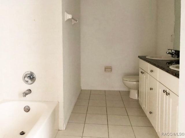 full bathroom featuring tile patterned flooring, vanity, bathing tub / shower combination, and toilet