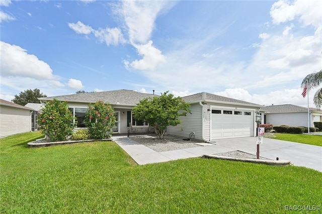 ranch-style home with a front lawn and a garage