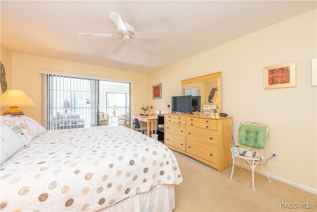 carpeted bedroom featuring ceiling fan and access to outside