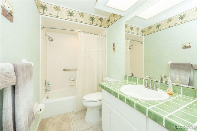 full bathroom with tile patterned floors, vanity, toilet, and shower / bath combo