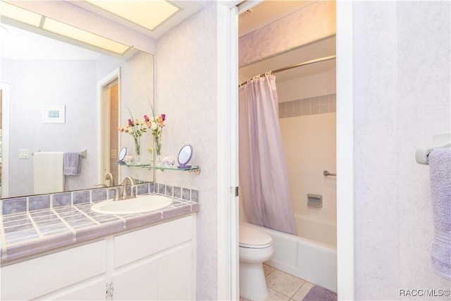 full bathroom with shower / bath combination with curtain, vanity, toilet, and tile patterned flooring