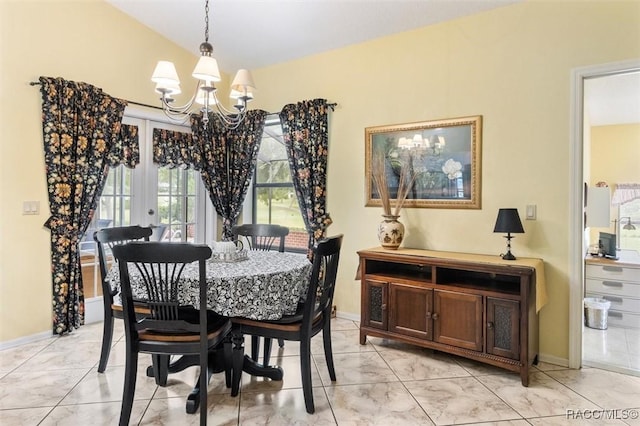 330 E Ireland Ct, Hernando, FL 34442 - dining area featuring a chandelier, light marble finish flooring, french doors, and baseboards