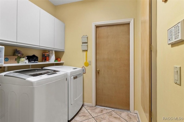 330 E Ireland Ct, Hernando, FL 34442 - laundry room with washing machine and clothes dryer, cabinet space, and baseboards