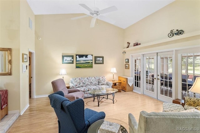 330 E Ireland Ct, Hernando, FL 34442 - living room featuring high vaulted ceiling, light wood-style floors, french doors, a ceiling fan, and baseboards