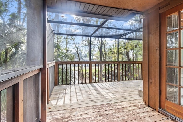 wooden deck with a lanai