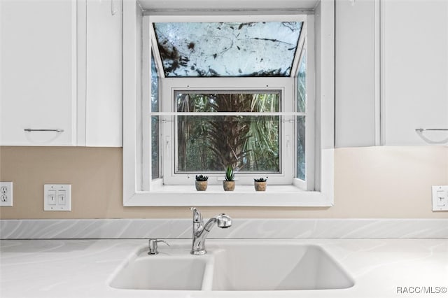 details with sink and white cabinets