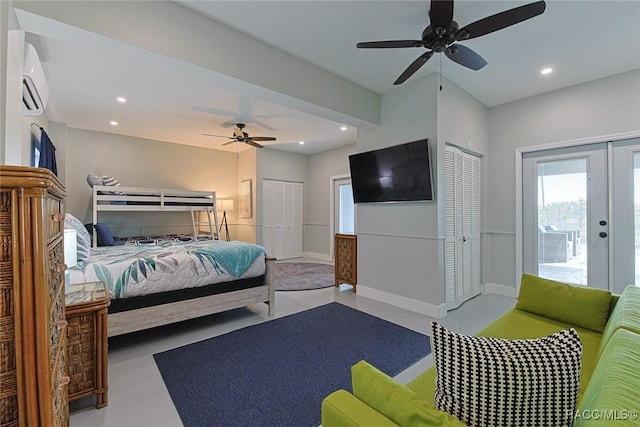 bedroom with french doors, ceiling fan, a wall mounted AC, and access to outside