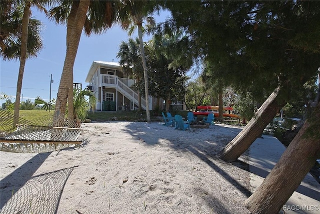 exterior space featuring a fire pit