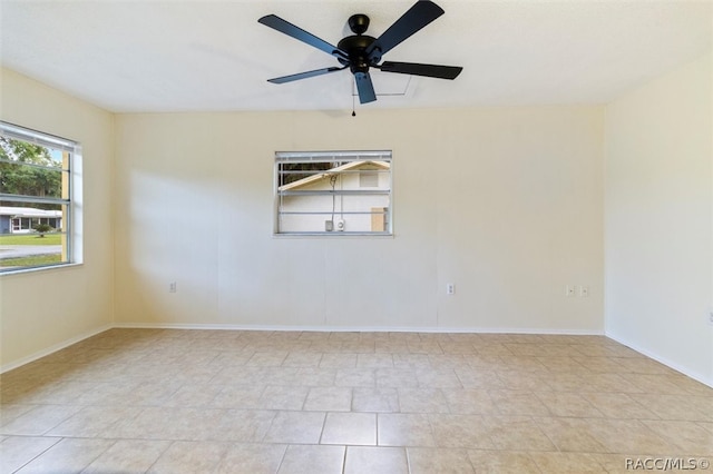 unfurnished room featuring ceiling fan