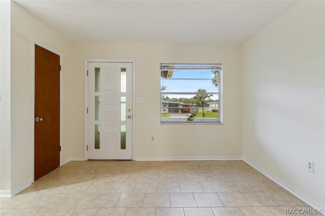 foyer with light tile patterned floors