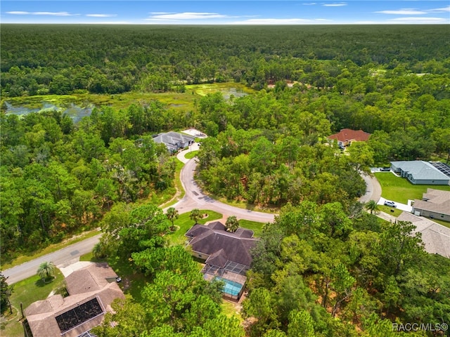 aerial view featuring a view of trees