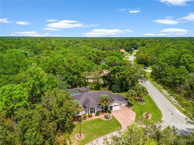 aerial view featuring a view of trees