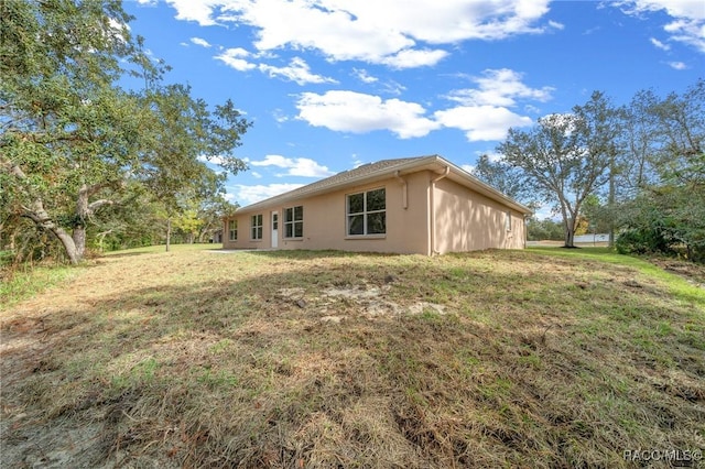 exterior space featuring a lawn