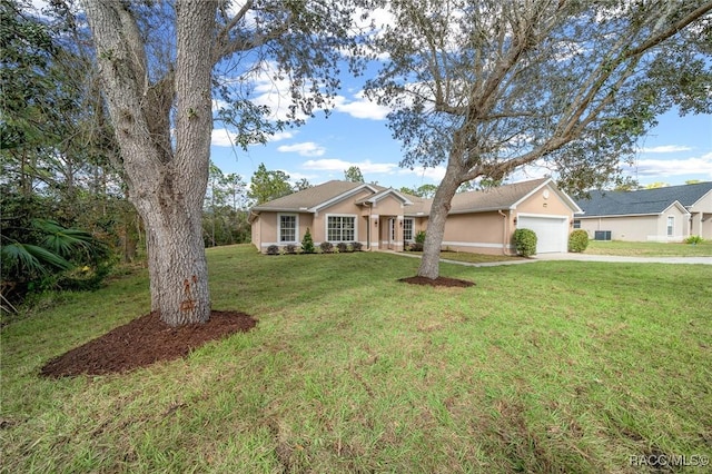 single story home featuring a garage and a front yard