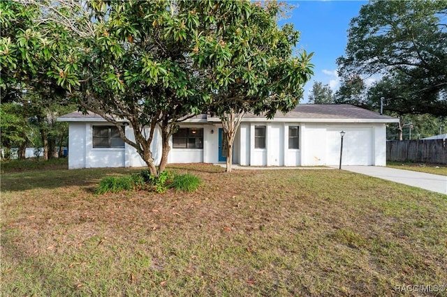 ranch-style home with a front lawn