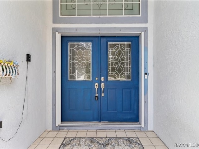 property entrance with french doors