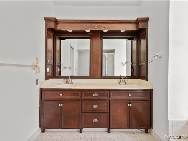 bathroom featuring vanity and walk in shower