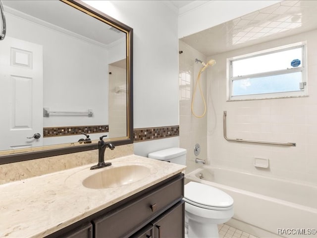 full bathroom with vanity, tiled shower / bath, tile patterned flooring, toilet, and ornamental molding