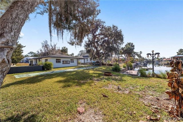 view of yard with a water view