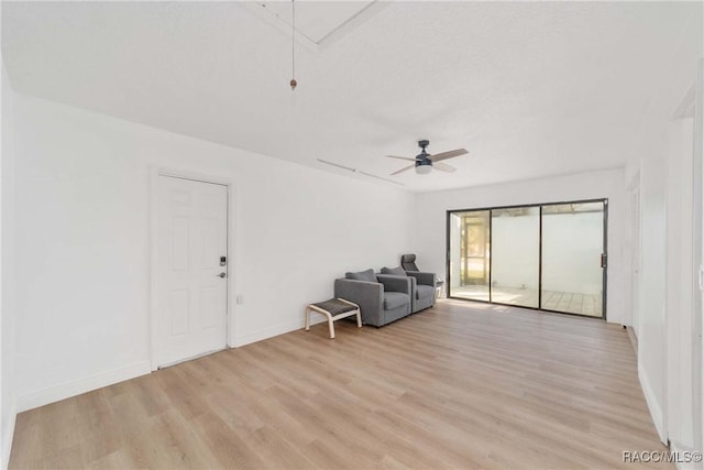 unfurnished room featuring light hardwood / wood-style floors and ceiling fan