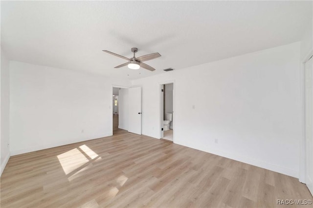 empty room featuring light hardwood / wood-style floors and ceiling fan