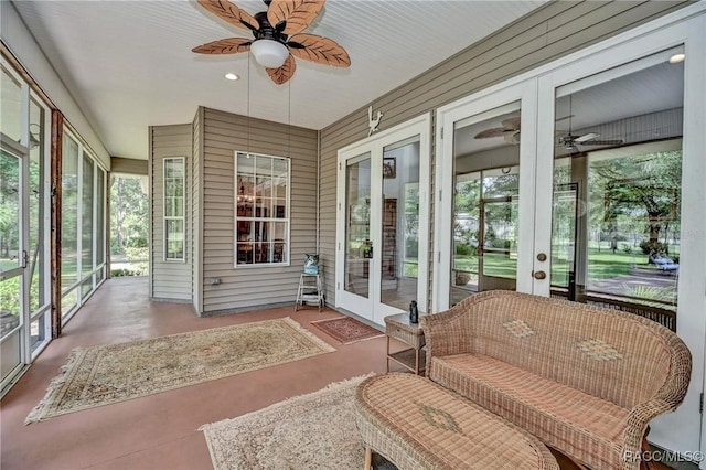 7802 N Fairwind Loop, Hernando, FL 34442 - sunroom with french doors, a ceiling fan, and plenty of natural light